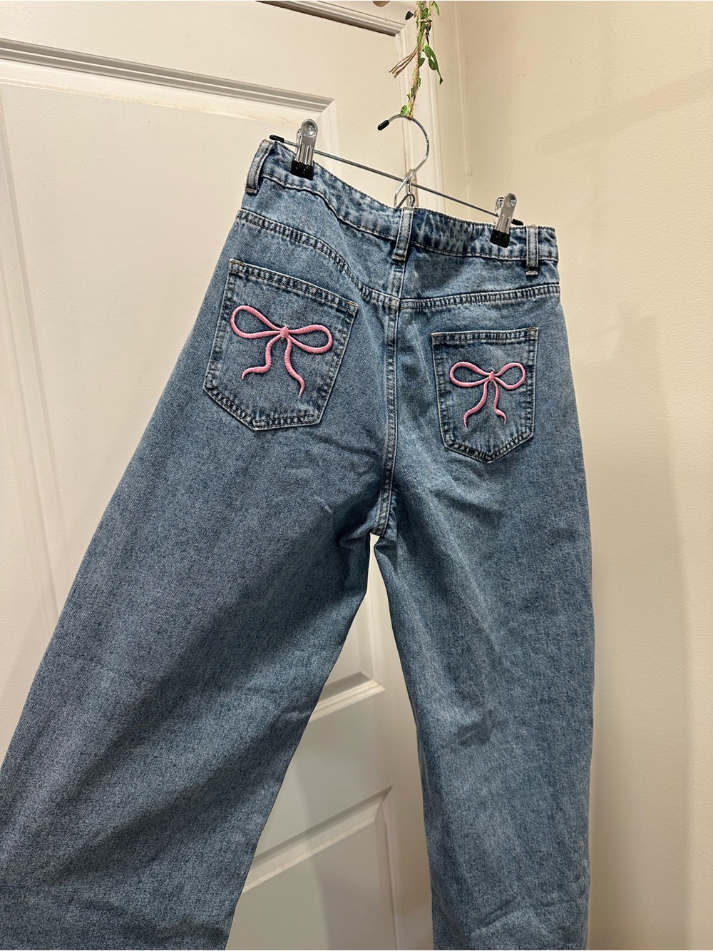 Wide Leg Blue Denim Jeans with Pink Bow Accent